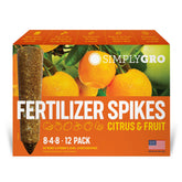 SimplyGro Fertilizer Spikes applied at citrus tree base for steady root feeding.