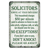 SmartCows humorous no-soliciting sign on front door deters interruptions with witty clarity.