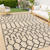 Smiry 6x9 outdoor rug with geometric pattern enhances the patio space.