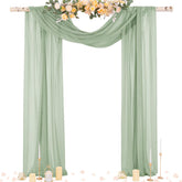 Socomi sage green sheer arch drape over wedding arch creates romantic backdrop