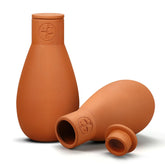 Soilagua ollas 16oz self-watering pot for steady root hydration indoors.