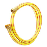 Solution4Patio short yellow leader hose coiled for compact storage and easy access.