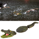 Sotiff floating alligator decoy in pool for wildlife deterrence and visual realism.