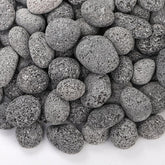 SOUJOY lava rocks for fire pit 1-2 inch stones arranged for even flame distribution.