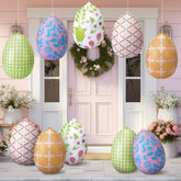 Soulchen inflatable Easter eggs with floral design brighten the lawn for a festive outdoor display.