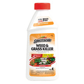 Spectracide Weed & Grass Killer Concentrate bottle ready for spot treatment on sidewalks.