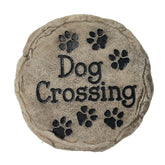 Spoontiques dog crossing stepping stone in a welcoming garden path