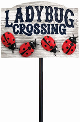 Spoontiques Ladybug Crossing Garden Stake adds whimsy to your yard with durable resin.