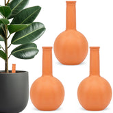 Srapwati 30oz terracotta watering globe delivering steady moisture to plant roots.