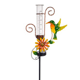 Stargarden hummingbird rain gauge decor brightens the garden while measuring rainfall.
