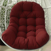 STAYDEN Egg Chair Cushion wine red on patio for lounging