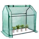 SUMGROW Mini Greenhouse tabletop setup demonstrates compact gardening capability for small spaces.