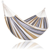 SUNCREAT large hammock ready for tree setup in a sunny yard.