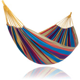 Suncreat outdoor double hammock with colorful stripes for backyard relaxation.