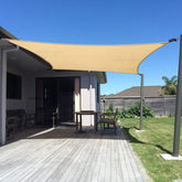 SUNNY GUARD sun shade sail 10x13 in sand blocks UV rays and offers breathable shade.