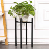 Sunnyglade plant stand with metal base and legs for stable indoor support.