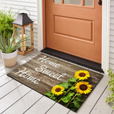 SuQKXCo Sunflower Welcome Doormat on wood background; soft touch and inviting curb appeal