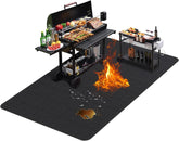 TAOMAND large grill mat 76x52 in use protects deck from spills and embers.