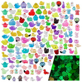 Teenzee mini resin animals glow at night for playful garden accents.