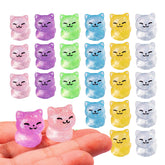 Teenzee 36-mini resin glitter cats set in a portable box for DIY crafting.