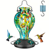 Tegarbed hand-blown glass hummingbird feeder with blue fireworks pattern attracts hummingbirds while staying drip-free.