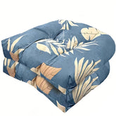 TESICA U-shaped wicker cushion on outdoor chair adds comfortable support