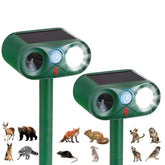 TFKK 2Pack solar deterrent front view with strobe lights deterring wildlife in a garden