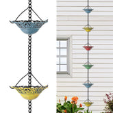 Tfro and Cile rain chain cups show colorful design guiding rainwater along the gutter.