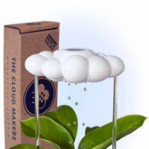 The Cloud Makers Dripping Rain Cloud over a plant pot for gentle, controlled watering