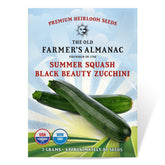 The Old Farmer's Almanac Black Beauty zucchini seeds packet ready for planting