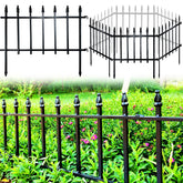 Thealyn metal decorative garden fence panel borders a flower bed with a sleek border.