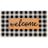 THEODORE MAGNUS buffalo check welcome mat enhances curb appeal while trapping dirt at the entry.