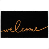 Theodore Magnus door mat with natural coir weave, dust-trap fibers near the doorway