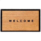 Theodore Magnus door mat coir for outdoor entrance with dirt-trapping fibers.