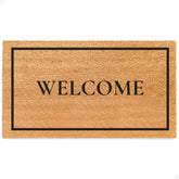 Theodore Magnus door mat front door angle shows durable entryway style.