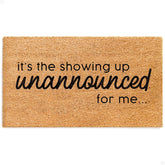 Theodore Magnus funny door mat with welcoming slogan and non-slip backing.