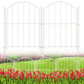 Thrivinest decorative garden fence panels arching over a flower bed in white for visual appeal