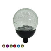TMKCW solar glass ball lights up the garden with color.