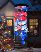 Toodour solar shell wind chime on patio adds coastal charm and soft ambient light