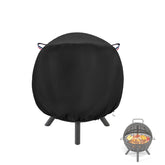Topcover fire pit cover on patio protecting a 36-inch globe fire ball.