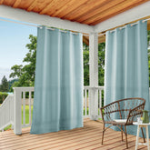 Town & Country Basics Cabana solid curtain panel in blue provides light filtering and privacy