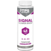 TPS Nutrients Signal Terpene Enhancer bottle beside a blooming plant.