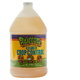 Trifecta Crop Control spray bottle on indoor plants for rapid pest control.