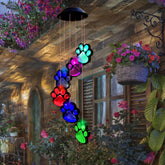 TSIPEKLO Paw Print Wind Chime outdoor with paw motif and ambient glow.