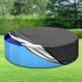 Tufmunb round dog pool cover in full view keeping debris out