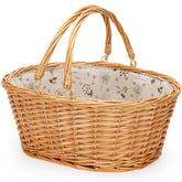 TwentyNext wicker picnic basket with folding handles, easy to carry on outdoor adventures.