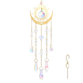Tyqour crystal suncatcher with a gold flame moon pendant catching sunlight indoors to reveal a rainbow.