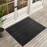 ubdyo dirt trapping door mat captures mud at the threshold, keeping entryways cleaner.