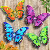 ULENDIS metal butterfly wall decor four-pack adds vibrant color to garden fences.