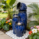 Ultym 29-inch ceramic fountain in cobalt glaze serves as a tranquil outdoor centerpiece.